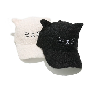 Cute winter baseball caps with cat ears and feline face embroidery in black and cream