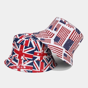 Detail of reversible bucket hats with distressed Union Jack and US flag star patterns