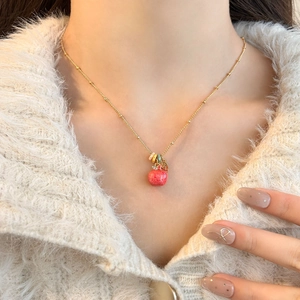 18k gold plated necklace featuring a red apple pendant on a gold bead chain