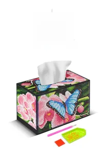 Close-up of DIY diamond painting tissue box kit with blue butterfly floral pattern