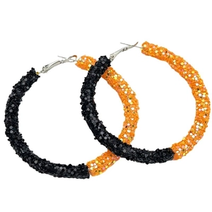 Oversized hoop earrings with orange and black basketball texture and sparkling finish