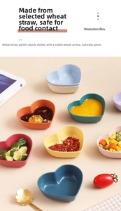 Detail of eco-friendly wheat straw heart-shaped sauce dishes in various pastel colors