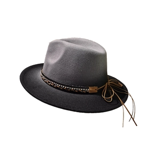 Vintage wool fedora hat with grey to black gradient and woven leather band detail