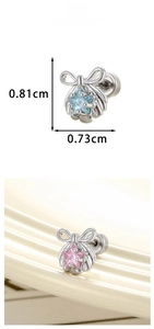 Detailed view of bowknot starfish studs with blue and pink cubic zirconia stones