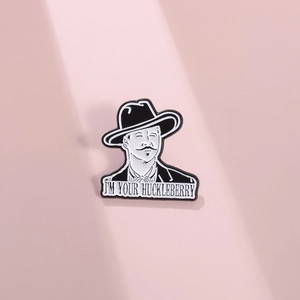 Classic I'M YOUR HUCKLEBERRY cowboy enamel pin with black and white artistic finish