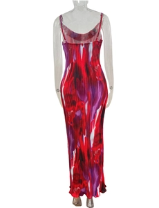 Close-up of backless pleated maxi dress with abstract red and purple artistic print