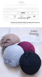 Detail view of Australian wool beret featuring bow decoration and adjustable sizing