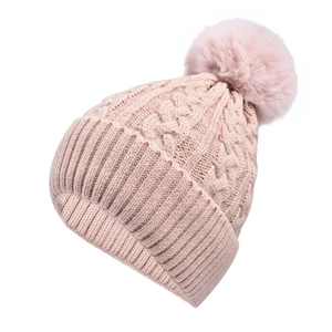 Pink cable-knit beanie with large pompom decoration and ribbed cuff on white background