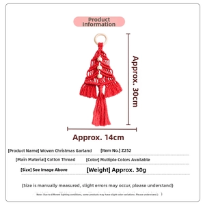 Detailed macro view of handmade red woven cotton Christmas tree ornament with white beads