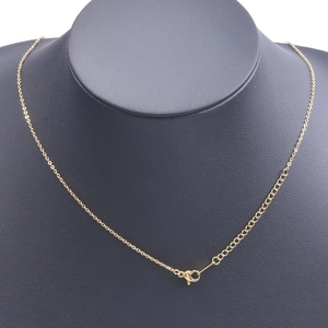 Detail of 18k gold plated stainless steel cable chain with lobster clasp and extender