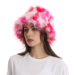 Close-up of pink and white plush faux fur bucket hat showing soft fuzzy texture