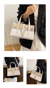 Detail of floral pattern flap and white textured leather on vintage shoulder bag