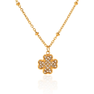 Macro shot of 18K gold plated four-leaf clover pendant with sparkling crystal rhinestones