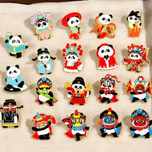 Chinese panda enamel pin collection featuring traditional costumes on fabric background