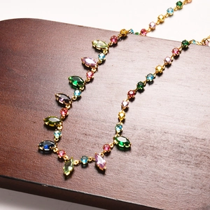 18K gold plated chain necklace featuring colorful oval crystals and shimmering diamonds
