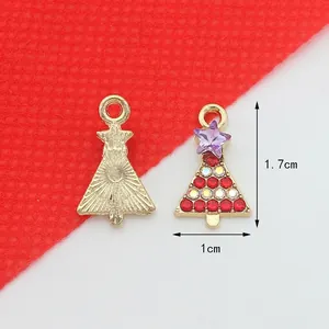 Macro view of Christmas tree alloy charm with red rhinestones and 1.7cm size detail