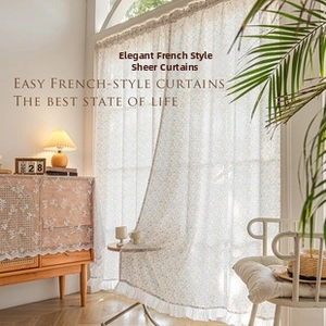Detail of French minimalist lace shower curtain with light floral patterns and ruffled hem