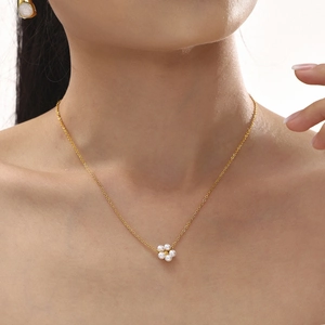 French style gold layered necklace with pearl tassel and irregular oval flower pendant