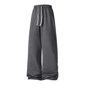 Relaxed fit dark grey cotton sports trousers with adjustable drawstring and wide leg cut