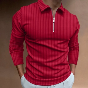 Detail of red men's polo shirt featuring ribbed knit texture and silver zipper neckline