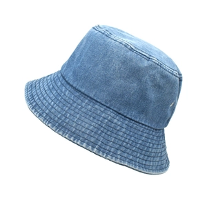 Classic vintage washed blue denim bucket hat for men and women shown from a side angle