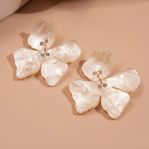 Vintage pearlescent flower stud earrings with diamonds and irregular resin petals