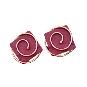 Vintage burgundy square stud earrings with gold spiral design and silver needle posts