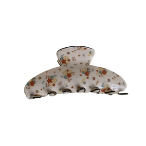 Floral acrylic hair claw clip with vintage small flower patterns in cream white finish