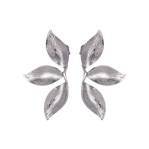 Macro detail of silver sunflower leaf earrings with realistic metallic textures
