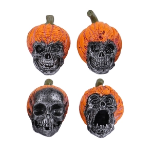 Set of four Halloween pumpkin skull resin figurines with diverse spooky facial expressions