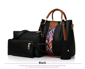 Close-up of black synthetic leather 4-piece handbag set with woven handle details