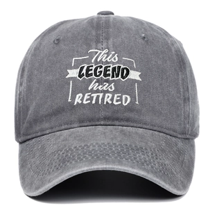Grey washed cotton baseball cap with This Legend Has Retired embroidery on a white background