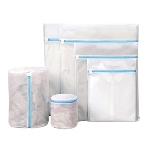 6-piece white fine mesh laundry bag set with blue zippers for washing machines