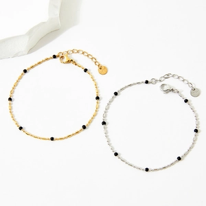 Minimalist stainless steel beaded bracelet with gold and silver finishes and lobster clasp