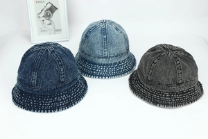 Three shades of vintage denim bucket hats in dark blue, light blue, and charcoal grey