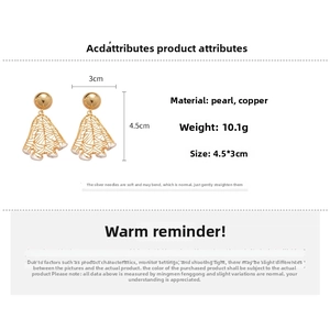 Detailed view of gold fan-shaped hollow earrings with 4.5x3cm dimensions and silver pins