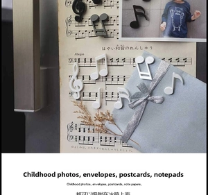 Detail showing musical note magnets holding sheet music on a refrigerator door