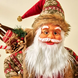 Classic Santa Claus figurine with red knit hat, gold glasses and gift bag decor