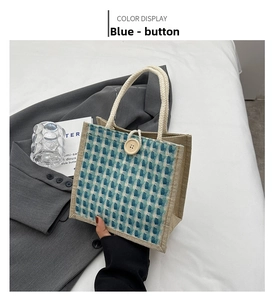Detail of blue and white checkered jute tote bag with round wooden button and rope handle
