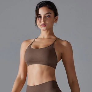 Detail of seamless brown sports bra with U-neck and ribbed hem for support