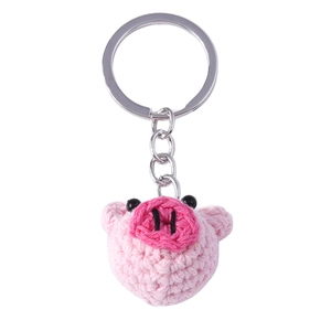 Handmade pink crochet pig keychain with high-quality knit texture and silver metal ring
