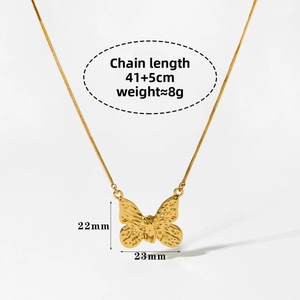 Detail showing butterfly pendant measurements 23x22mm and 41+5cm chain length on gold necklace