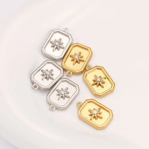 Set of 6 gold and silver stainless steel rectangle pendants with starburst crystals