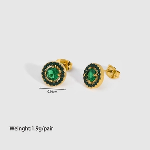 Macro shot of gold emerald zircon stud earrings detailing size 0.94cm and weight 1.9g