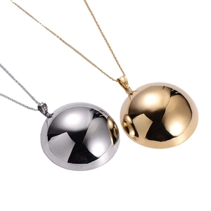 Minimalist large spherical pendant necklace in polished gold and silver finishes