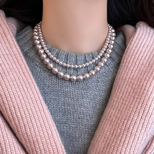 Double-layered mauve pearl necklace with elegant round beads for women
