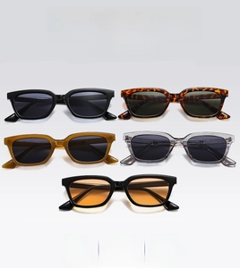 Flat lay view of retro square sunglasses in black, tortoise, amber, and grey frame colors