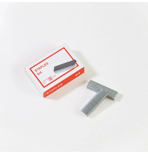 Macro detail of 6/4 silver metal staples 4mm size for office stationery use