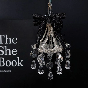 Elegant crystal chandelier ornament with black glitter bow and teardrop glass charms