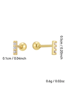 Detailed view of 14K gold-plated bar stud earrings with three pavé-set zircons